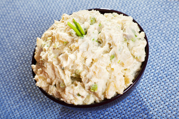 Patato and avocado mash garnished with mayonnaise