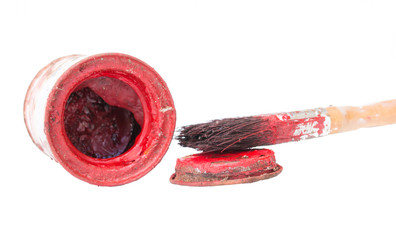 red paint tin on white background