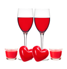 Classic Glass of Red Wine, red hearts and candles isolated on wh