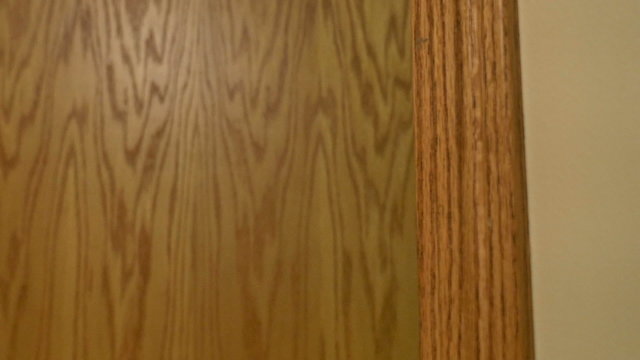 4K Man Enters and Exits Room Door Handle 4320