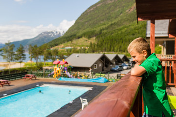 Boy at summer holiday resort in Norway