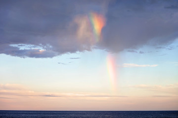 Naklejka na ściany i meble Sky clouds texture with rainbow, background. Dramatic sky cloud