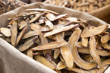 Licorice herbal dry out medicine in wooden chopped and sliced on