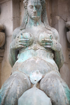 Closeup of a lactating nereid, the Fountain of Neptune, Bologna, Italy