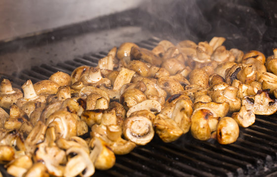 mushrooms grilling in the kitchen at the restaurant