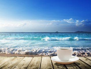 sea and cup of coffee