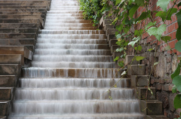 Waterfall on the stairs in town park