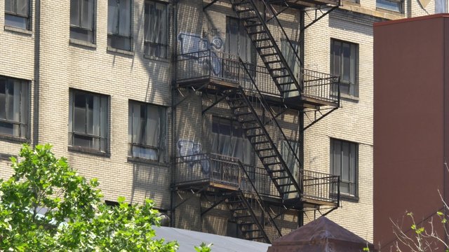 4K Typical New York Style Apartment Building Fire Escape Establishing Shot