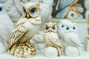 owl statues in a souvenir shop in Greece