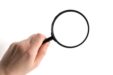 Hand holding magnifying glass isolated on white background