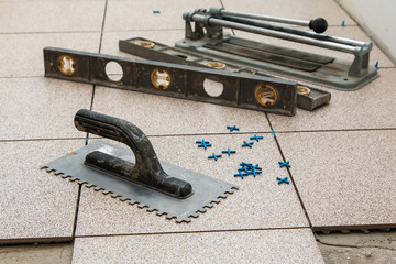 Installation of floor tiles