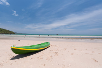 Fototapeta na wymiar Colorful kayak on the tropical beach