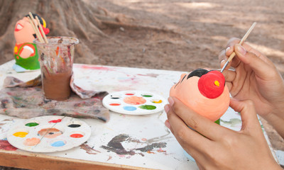 Painting pottery