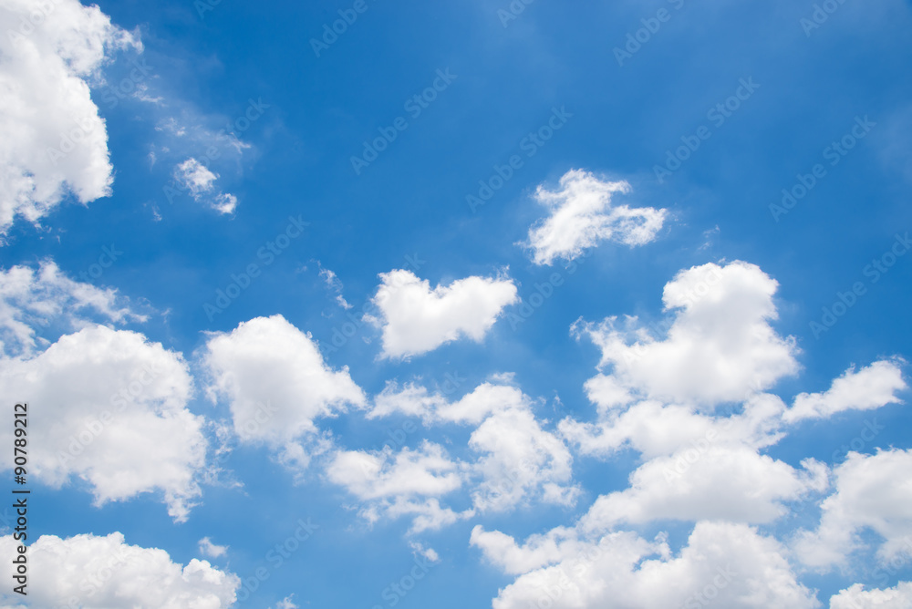 Wall mural blue sky background with tiny clouds