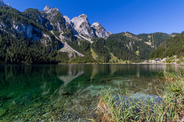 Beautiful landscape of mountains and lake on summertime, Gosausee lake, Alps, Austria, Europe.