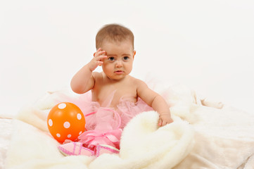 Cute and happy newborn baby playing, smiling, laughing