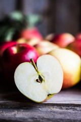 Apples on rustic wooden background