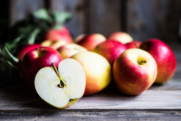 Apples on rustic wooden background