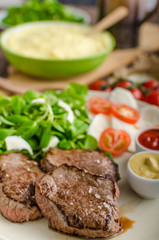 Beef steak with salad
