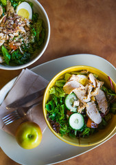 Healthy salads with vegetables and grilled chicken