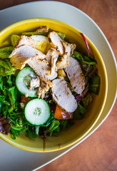 Healthy salads with vegetables and grilled chicken