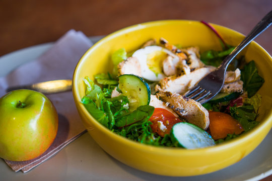 Healthy salads with vegetables and grilled chicken