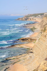 Costa Portuguesa com a praia do Magoito em Fundo
