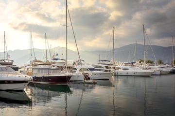 Fototapeta na wymiar Sailing boats in marina at sunset. Tivat. Montenegro