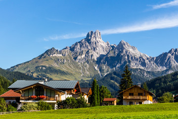 Fototapeta na wymiar Landscape of mountains, green field, sky, forest in Filzmoos, Salzburg, Austria