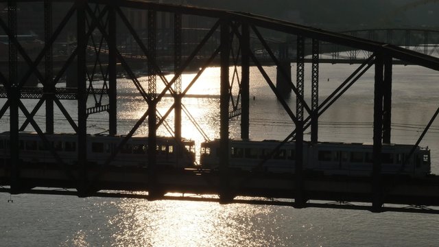 The T in Pittsburgh Travels Over the Monongahela River at Dusk