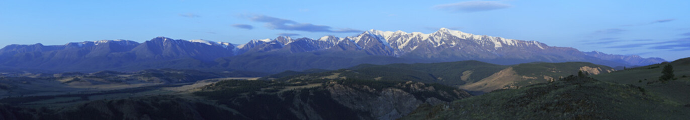 Fototapeta premium Panorama Kurai steppe and North Chuya ridge at dawn.