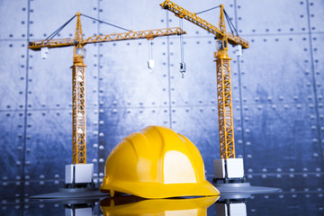 Buildings under construction and cranes 