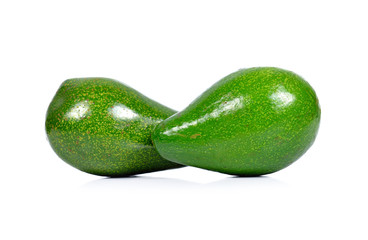 Fresh avocados on white background.