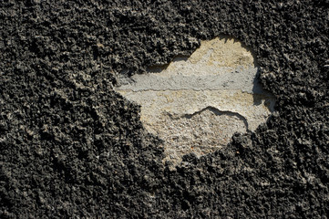 Plaster on the wall of an old house, close-up view.