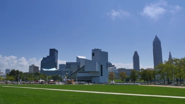 CLEVELAND, OH - Circa August, 2014 - An establishing shot of the Cleveland skyline and Rock and Roll Hall of Fame on a warm summer day.