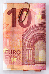 Ten euro with paper clip
