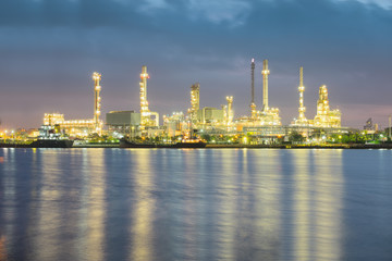 Oil gas refinery plant. May called petroleum, production or petrochemical plant. Industrial factory construction from engineering technology with steel pipe, pipeline, tank. Business for power energy.