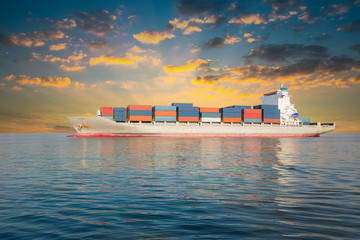 Obraz premium Global international logistics and transportation by cargo ship and cargo container by the sea and ocean, Ocean freight shipping services by cargo ship and cargo container, Import export background.