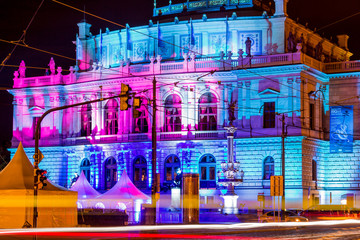 The philharmonic orchestra building in Prague, Czech Republic at night.