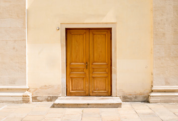 Fototapeta na wymiar Wooden doors in wall