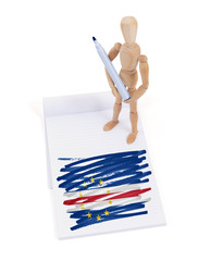 Wooden mannequin made a drawing - Cape Verde