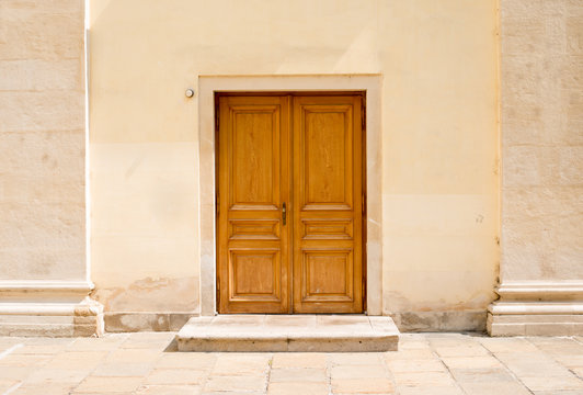 Wooden doors in wall