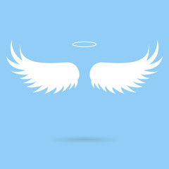 Fototapeta na wymiar Vector white paper wings on a blue matte background. Beautiful applique.
