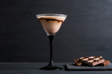 Chocolate martini on the wooden background