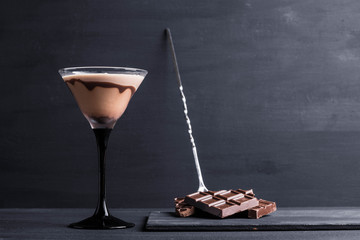 Chocolate martini on the wooden background