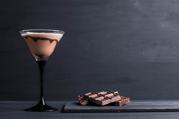 Chocolate martini on the wooden background