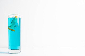 Blue cocktail on white background