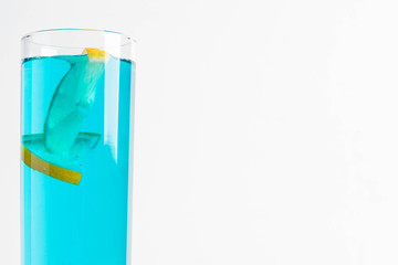 Blue cocktail on white background