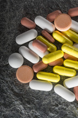 Stack of different colorful pills