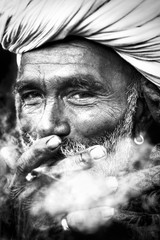 Indigenous Indian Man Smoking Happily Concept